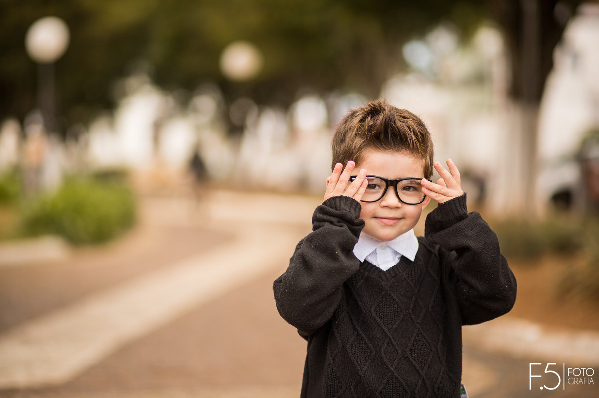 Book infantil, menino, óculos, fotógrafo Muzambinho