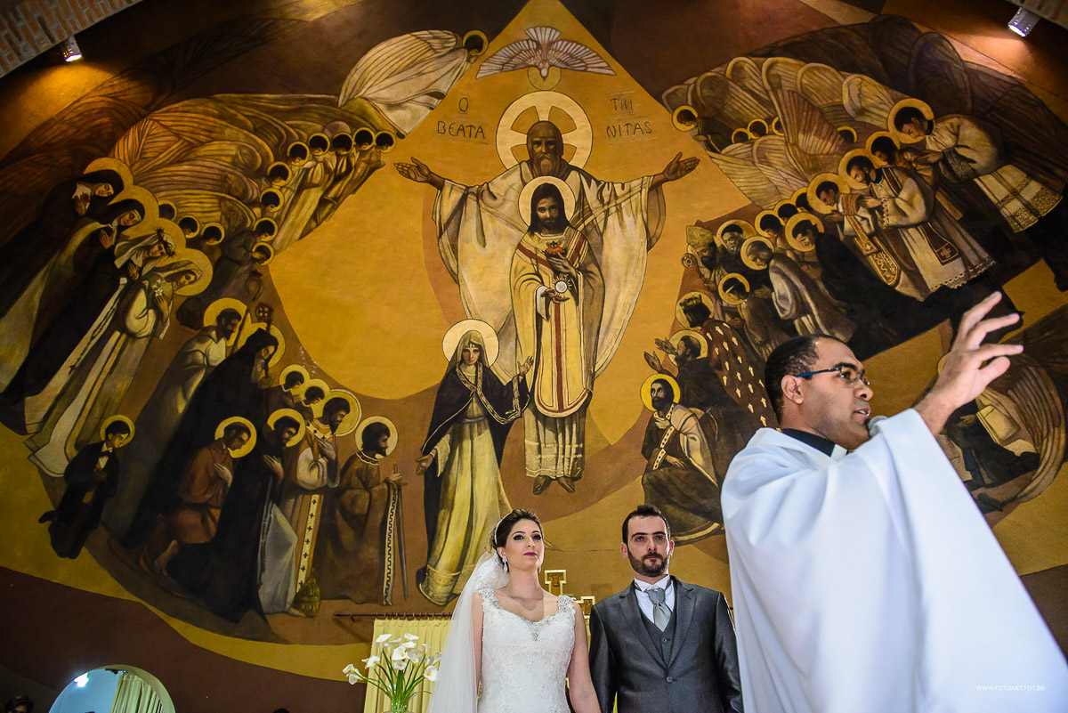 Noivos ouvindo homilia do padre Gustavo Viaro Correa na capela do Seminário Arquidiocesano São José  Botucatu por Anderson Silva Fotoart fotografo sp