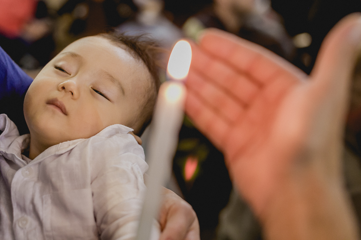 vela acessa no batizado do pedro