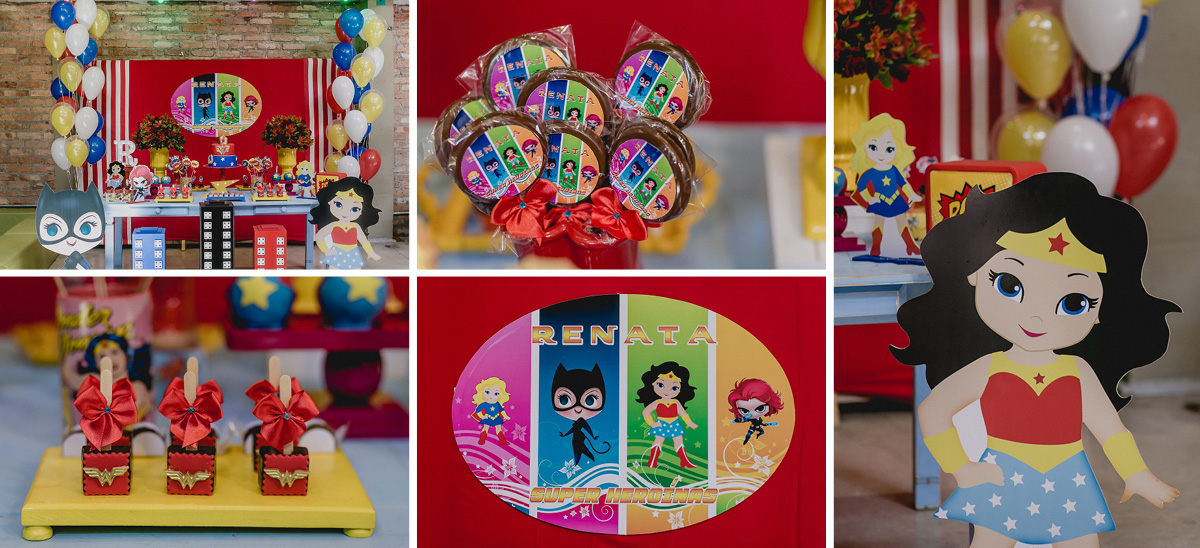 detalhes da mesa do bolo com o tema mulher maravilha super heroinas