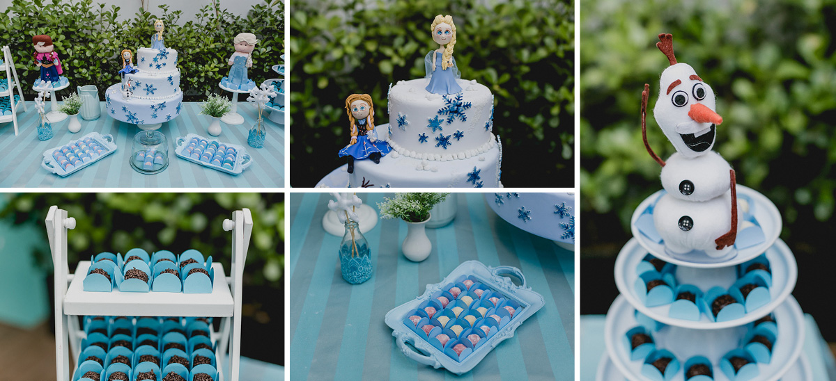 detalhes da mesa do bolo com o tema da frozen