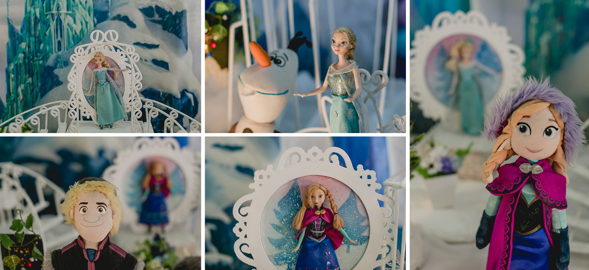 detalhes da mesa do bolo com o tema frozen