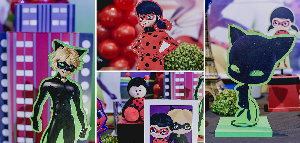 detalhes da mesa do bolo com o tema lady bug