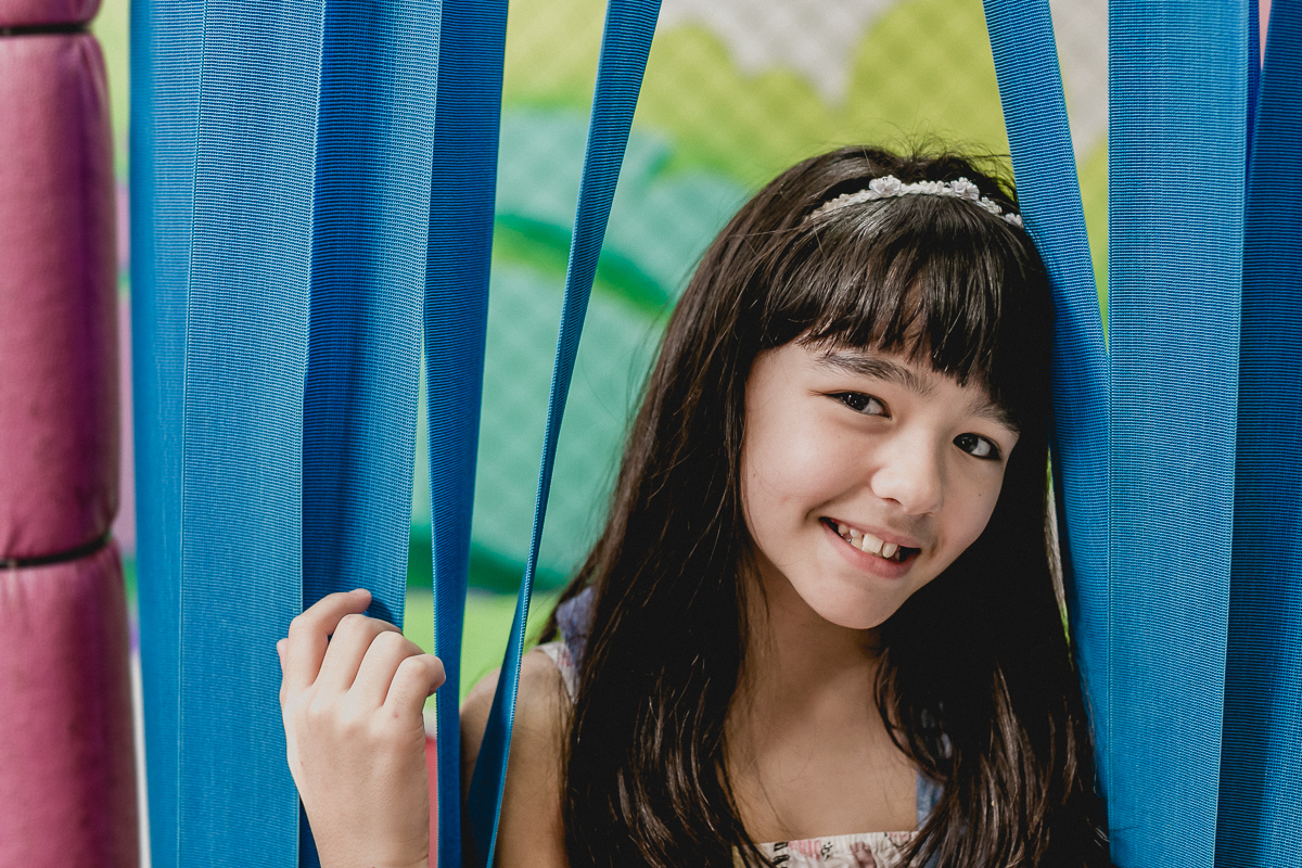 retrato da amiguinha na porta do pula pula