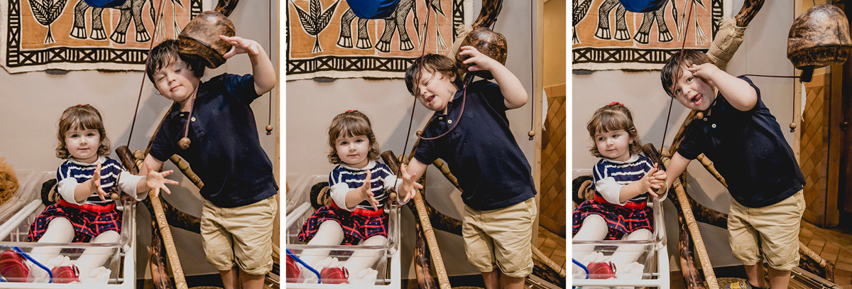 thiago batendo a cabela no instrumento de musica