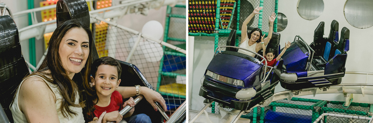 chris e a mamae brincando na montanha russa com as maos para cima