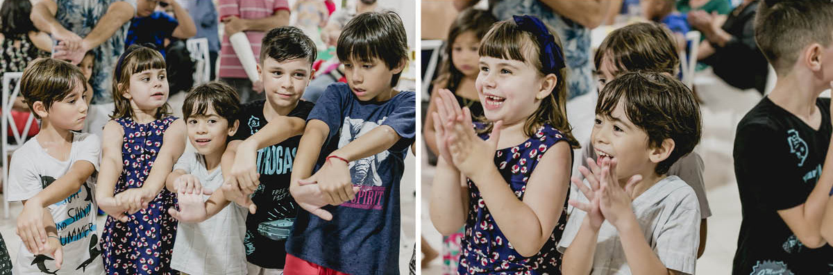 crianças gargalhando com o magico