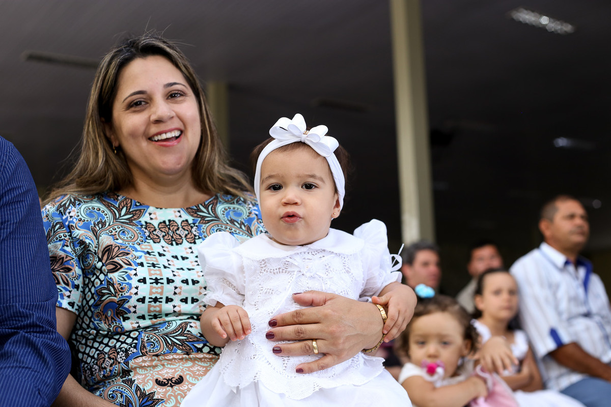 família no batizado da Maria Eduarda