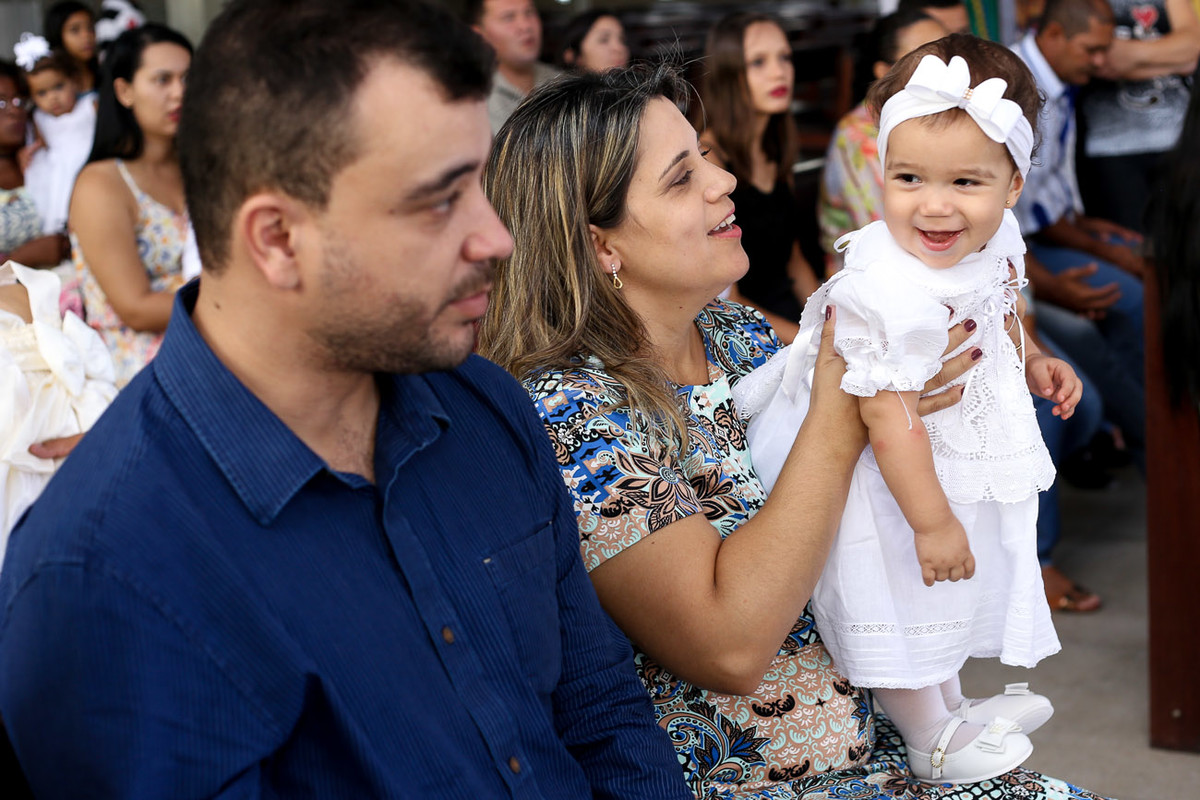 família no batizado da Maria Eduarda