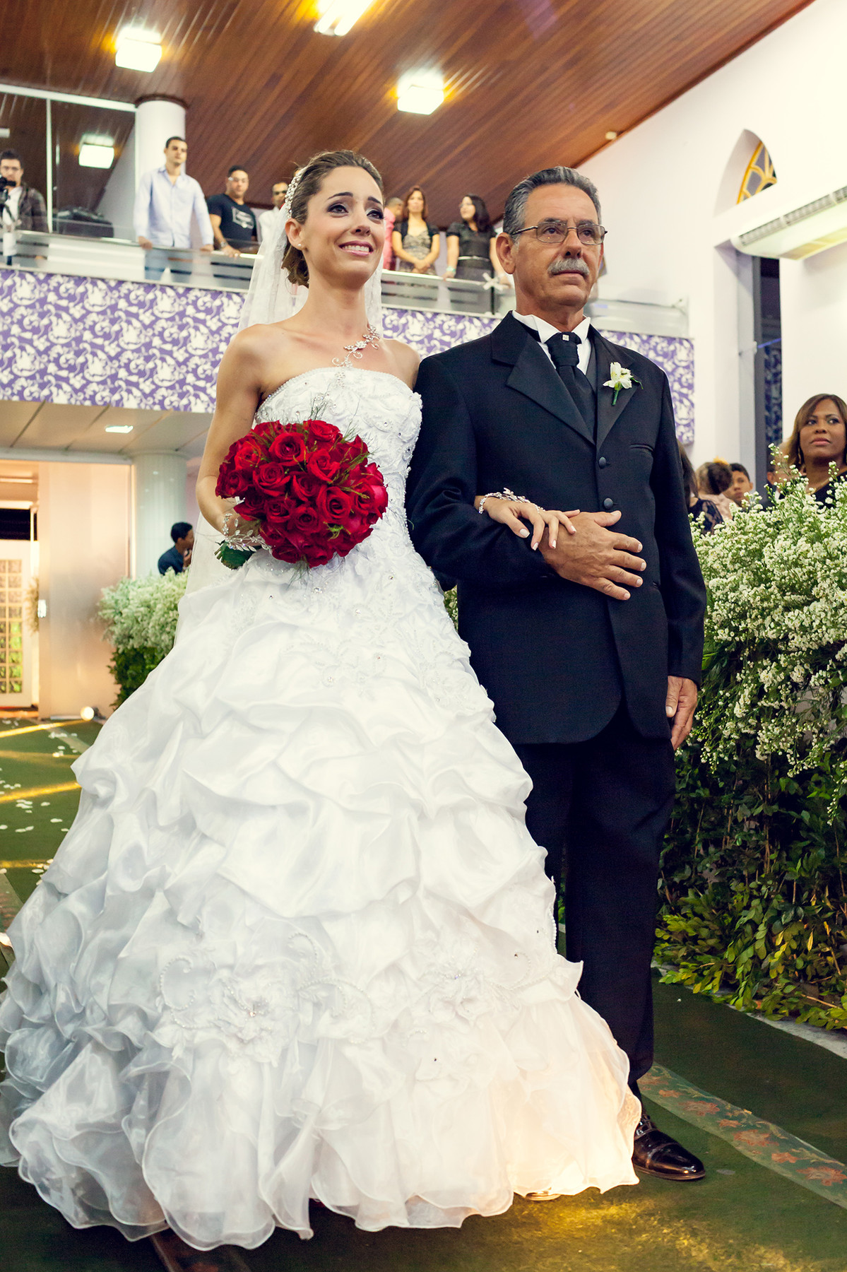 Noiva conduzida pelo pai