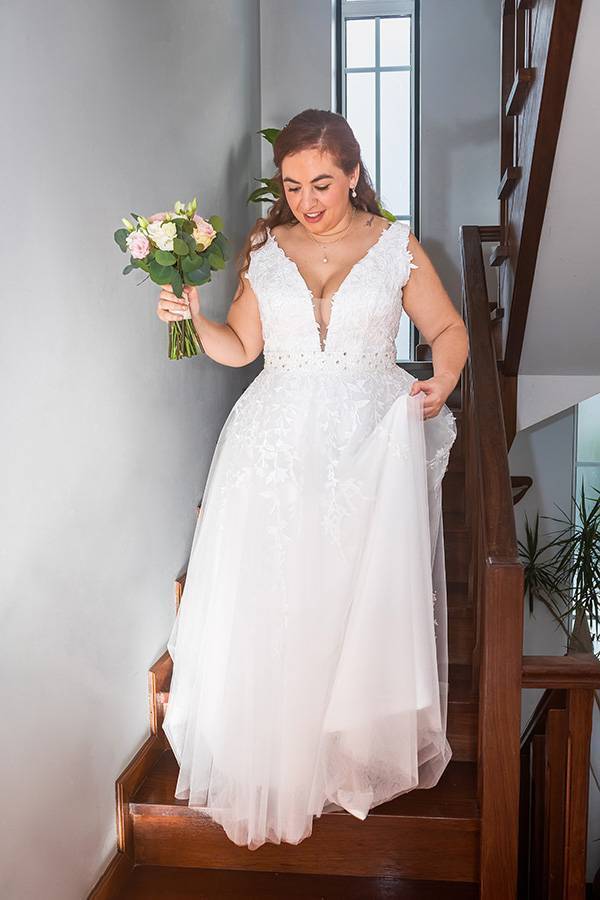 A noiva a descer as escadas