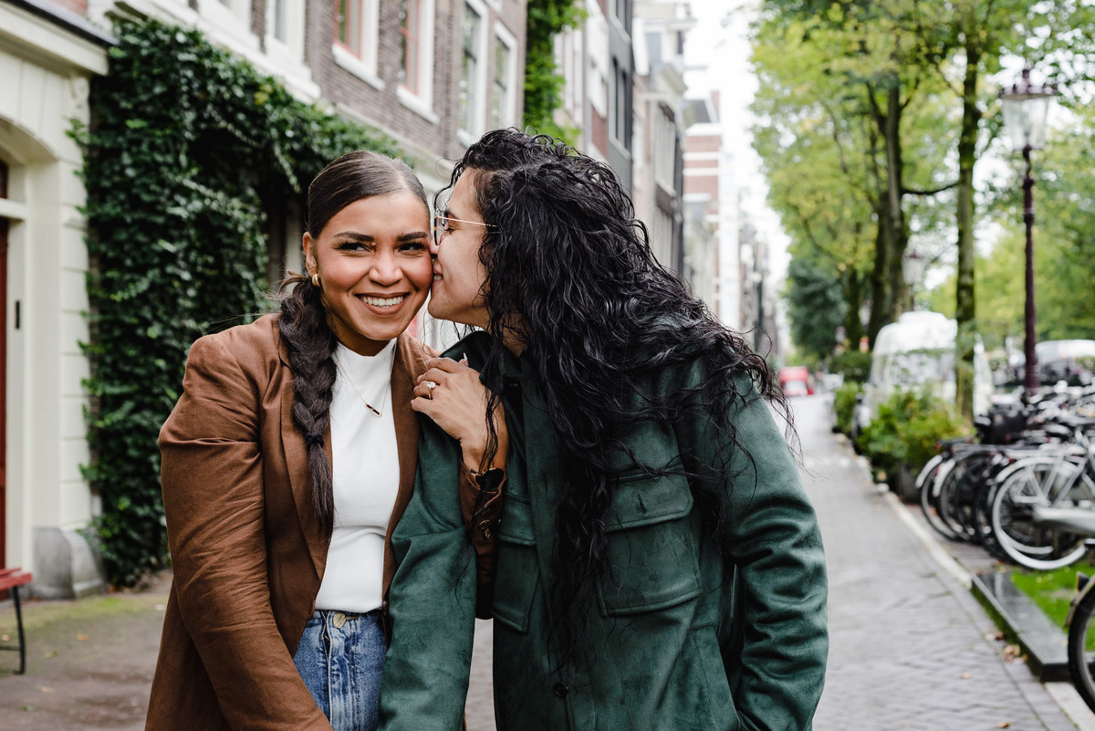  couple walking on a street in Amsterdam