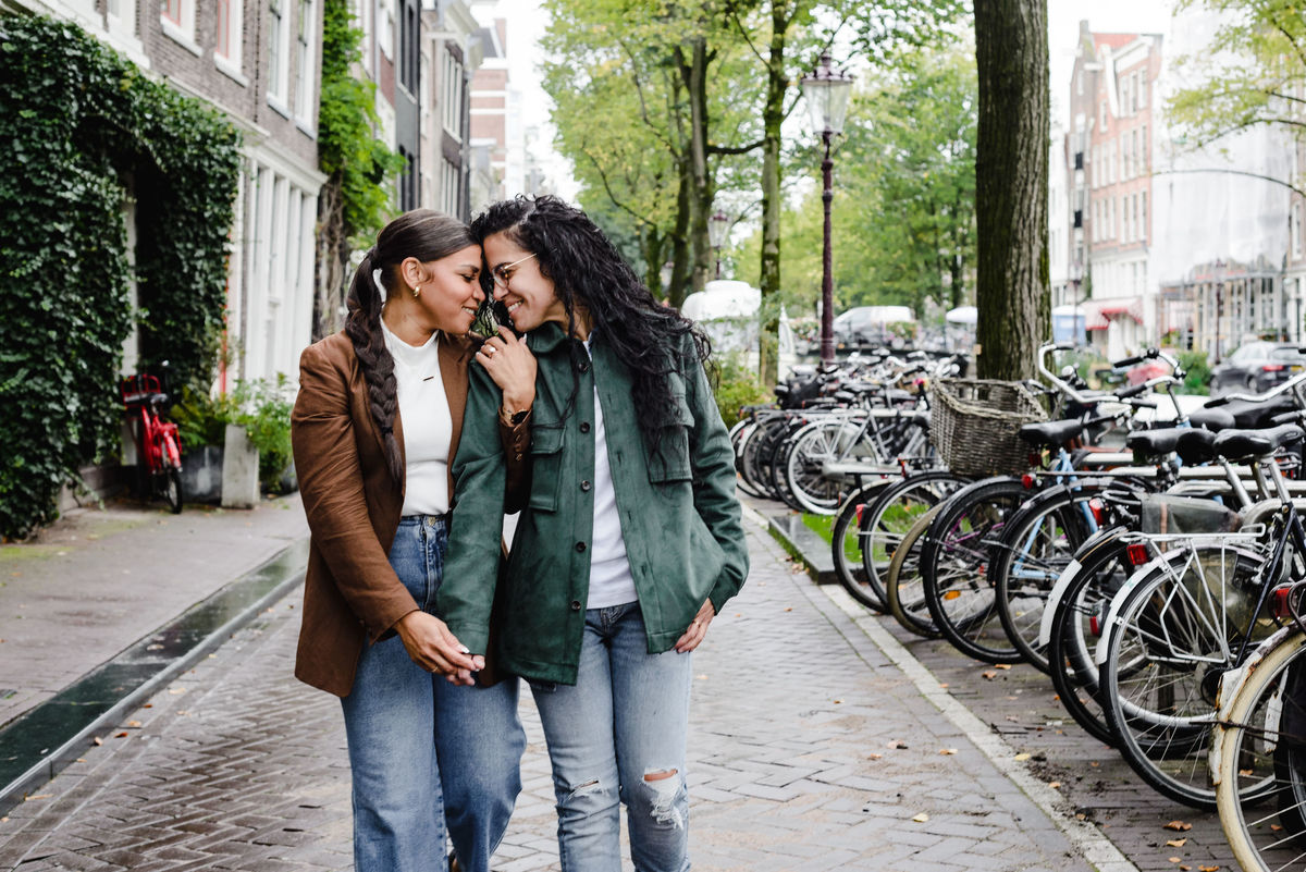  couple walking on a street in Amsterdam