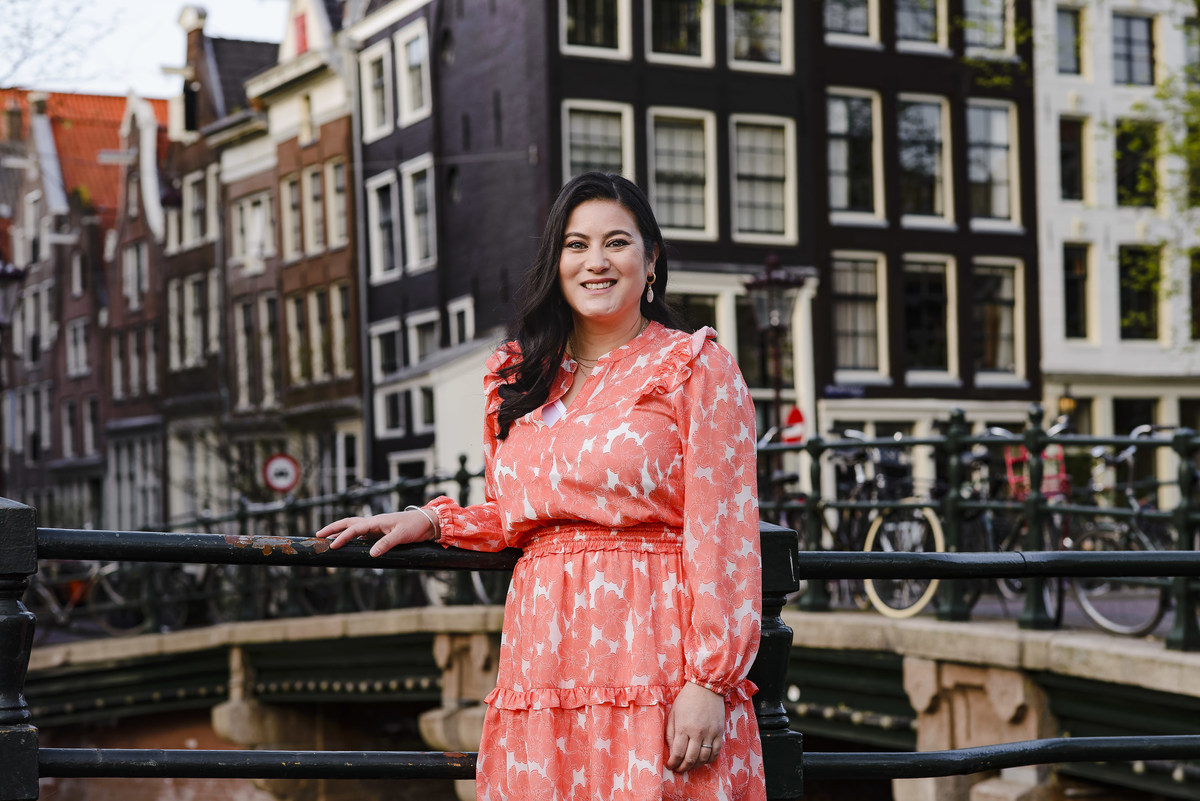 Family trip in Amsterdam, The Netherlands. Photo session in Amsterdam streets, canals and architecture of the jordaan area