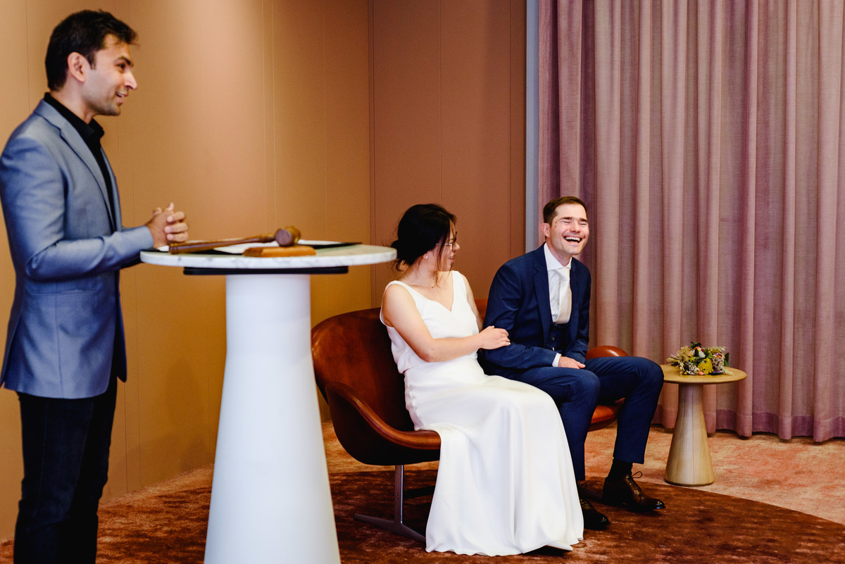 Wedding photographer in Amsterdam photographing a couple in love at gemeente Stadsloket Oost