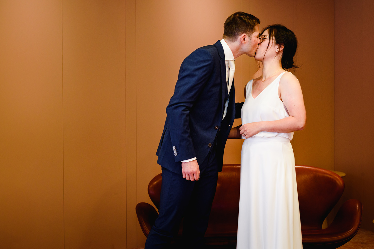 Wedding photographer in Amsterdam photographing a couple in love at gemeente Stadsloket Oost