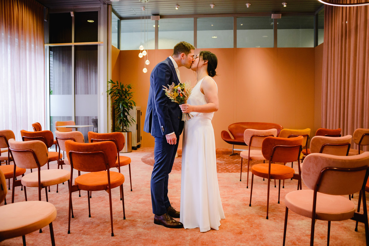 Wedding photographer in Amsterdam photographing a couple in love at gemeente Stadsloket Oost