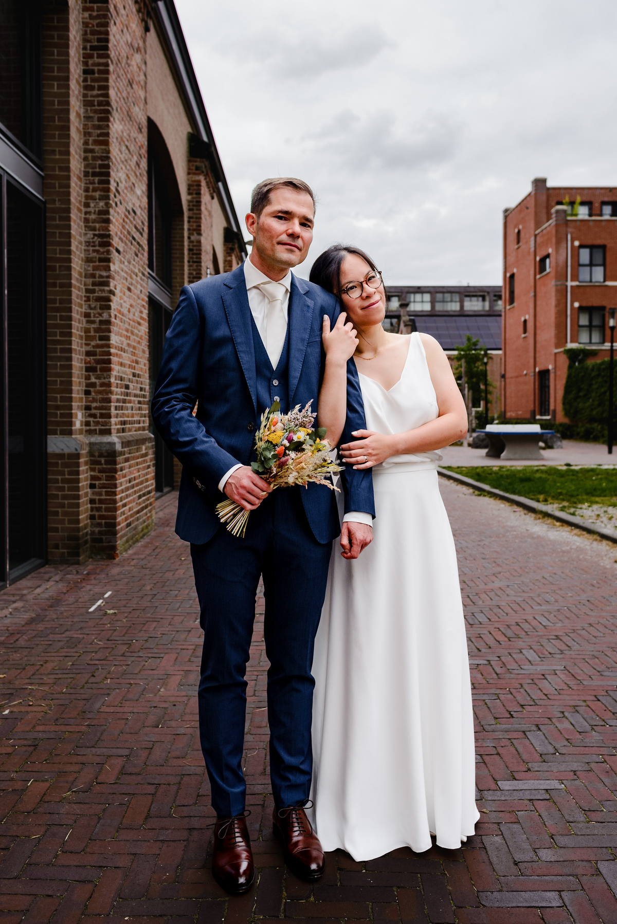 Wedding photographer in Amsterdam photographing a couple in love at gemeente Stadsloket Oost