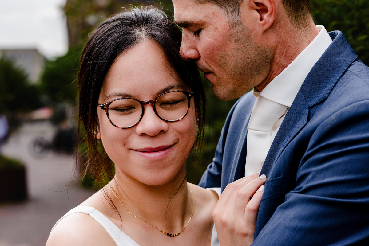 Wedding photographer in Amsterdam photographing a couple in love at gemeente Stadsloket Oost