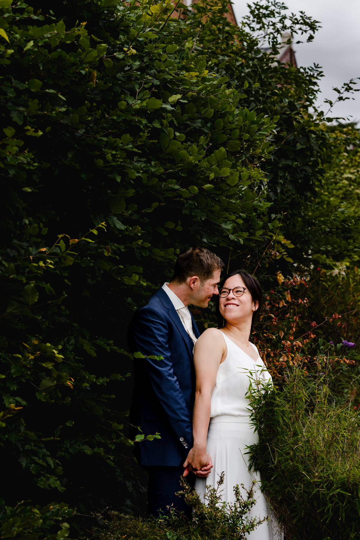 Wedding photographer in Amsterdam photographing a couple in love at gemeente Stadsloket Oost