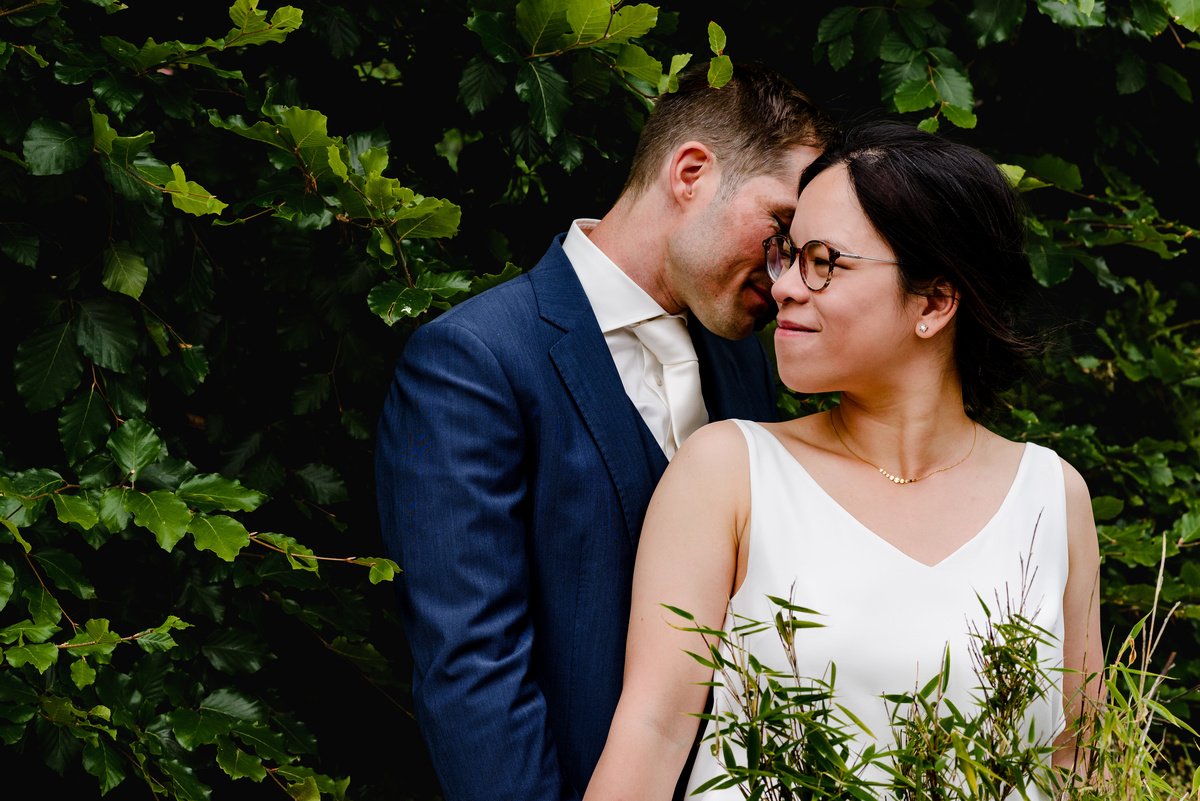 Wedding photographer in Amsterdam photographing a couple in love at gemeente Stadsloket Oost