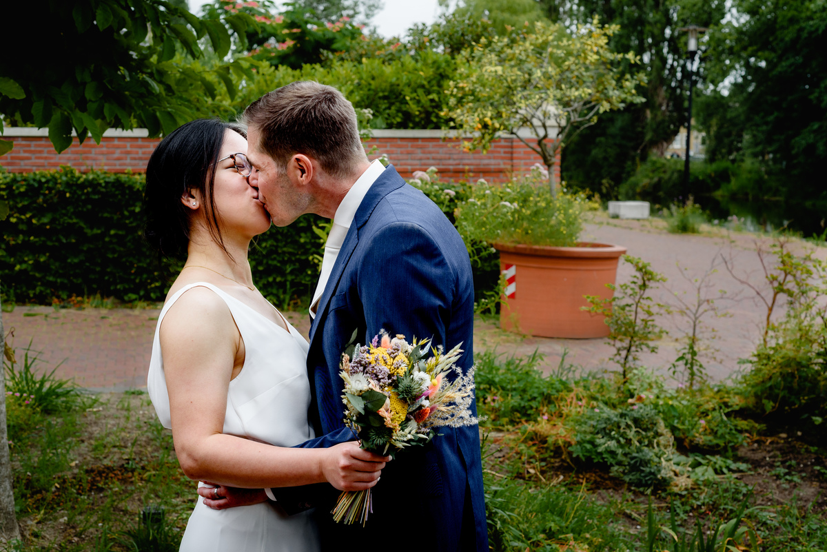 Wedding photographer in Amsterdam photographing a couple in love at gemeente Stadsloket Oost
