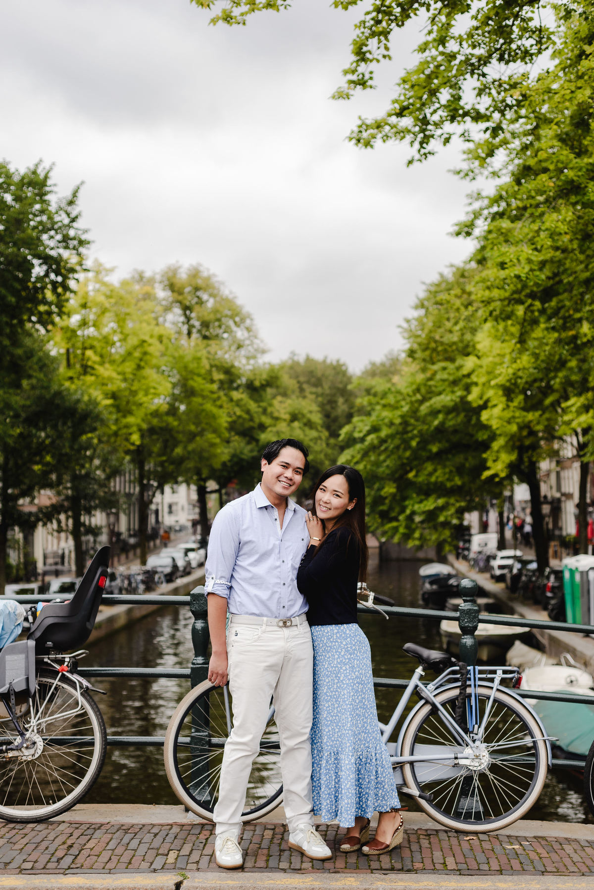 Capture Your Romantic Getaway in Amsterdam: Vacation Photographer for Couples. Explore Amsterdam's Canals and Bridges, Admire Iconic Houses and Bicycles in Pictures