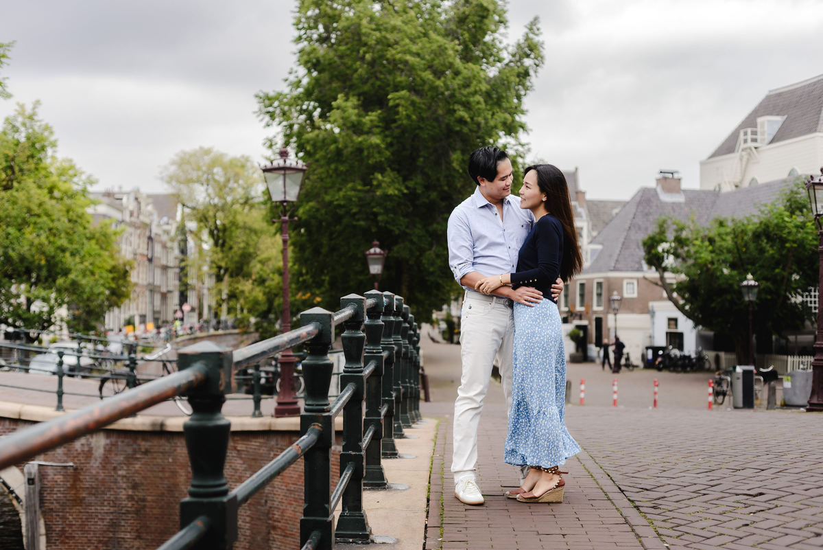 Capture Your Romantic Getaway in Amsterdam: Vacation Photographer for Couples. Explore Amsterdam's Canals and Bridges, Admire Iconic Houses and Bicycles in Pictures