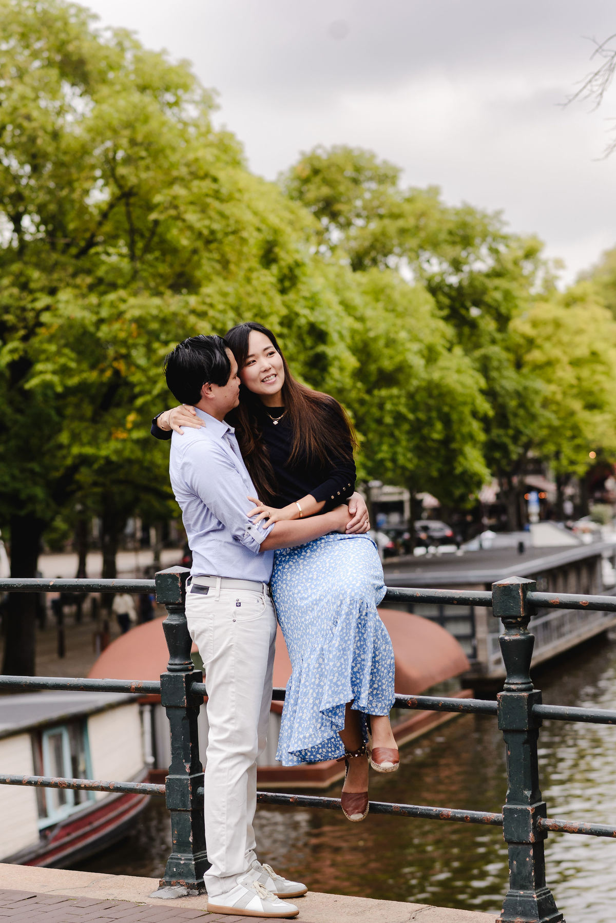 Capture Your Romantic Getaway in Amsterdam: Vacation Photographer for Couples. Explore Amsterdam's Canals and Bridges, Admire Iconic Houses and Bicycles in Pictures