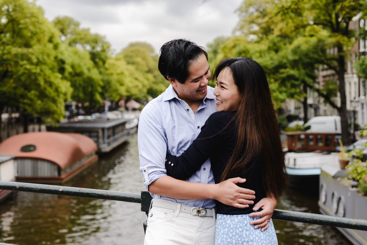 Capture Your Romantic Getaway in Amsterdam: Vacation Photographer for Couples. Explore Amsterdam's Canals and Bridges, Admire Iconic Houses and Bicycles in Pictures