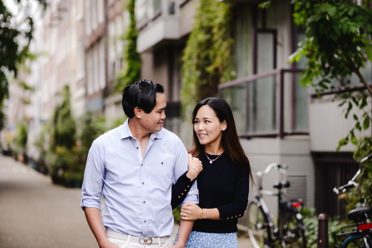 Capture Your Romantic Getaway in Amsterdam: Vacation Photographer for Couples. Explore Amsterdam's Canals and Bridges, Admire Iconic Houses and Bicycles in Pictures