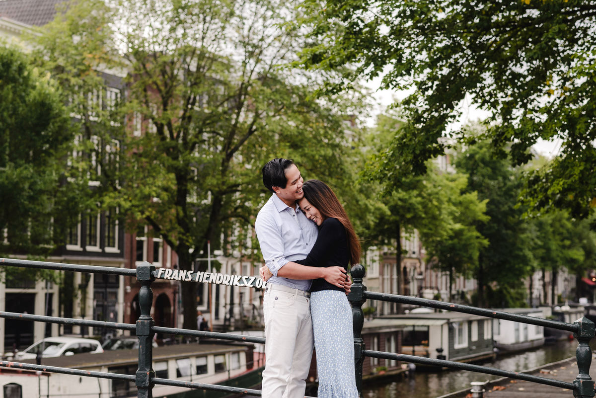 Capture Your Romantic Getaway in Amsterdam: Vacation Photographer for Couples. Explore Amsterdam's Canals and Bridges, Admire Iconic Houses and Bicycles in Pictures
