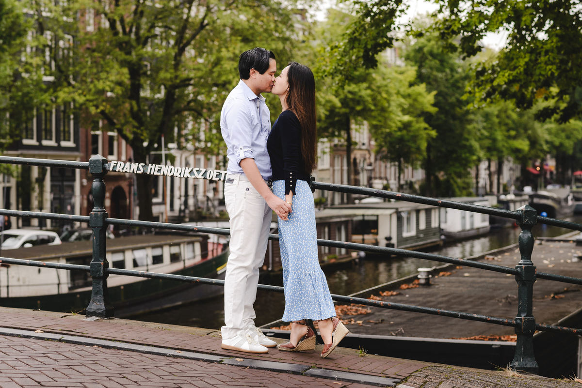 Capture Your Romantic Getaway in Amsterdam: Vacation Photographer for Couples. Explore Amsterdam's Canals and Bridges, Admire Iconic Houses and Bicycles in Pictures
