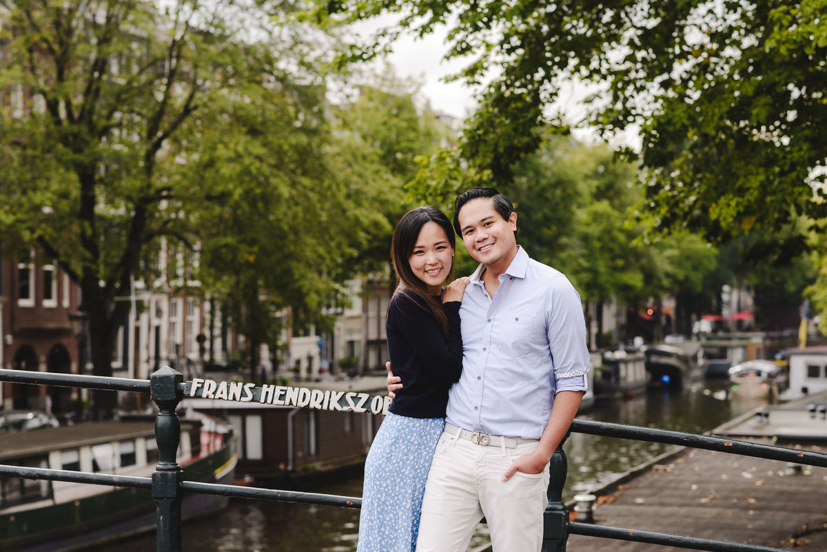 Capture Your Romantic Getaway in Amsterdam: Vacation Photographer for Couples. Explore Amsterdam's Canals and Bridges, Admire Iconic Houses and Bicycles in Pictures