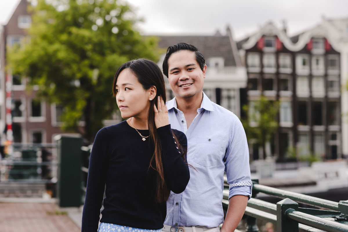 Capture Your Romantic Getaway in Amsterdam: Vacation Photographer for Couples. Explore Amsterdam's Canals and Bridges, Admire Iconic Houses and Bicycles in Pictures