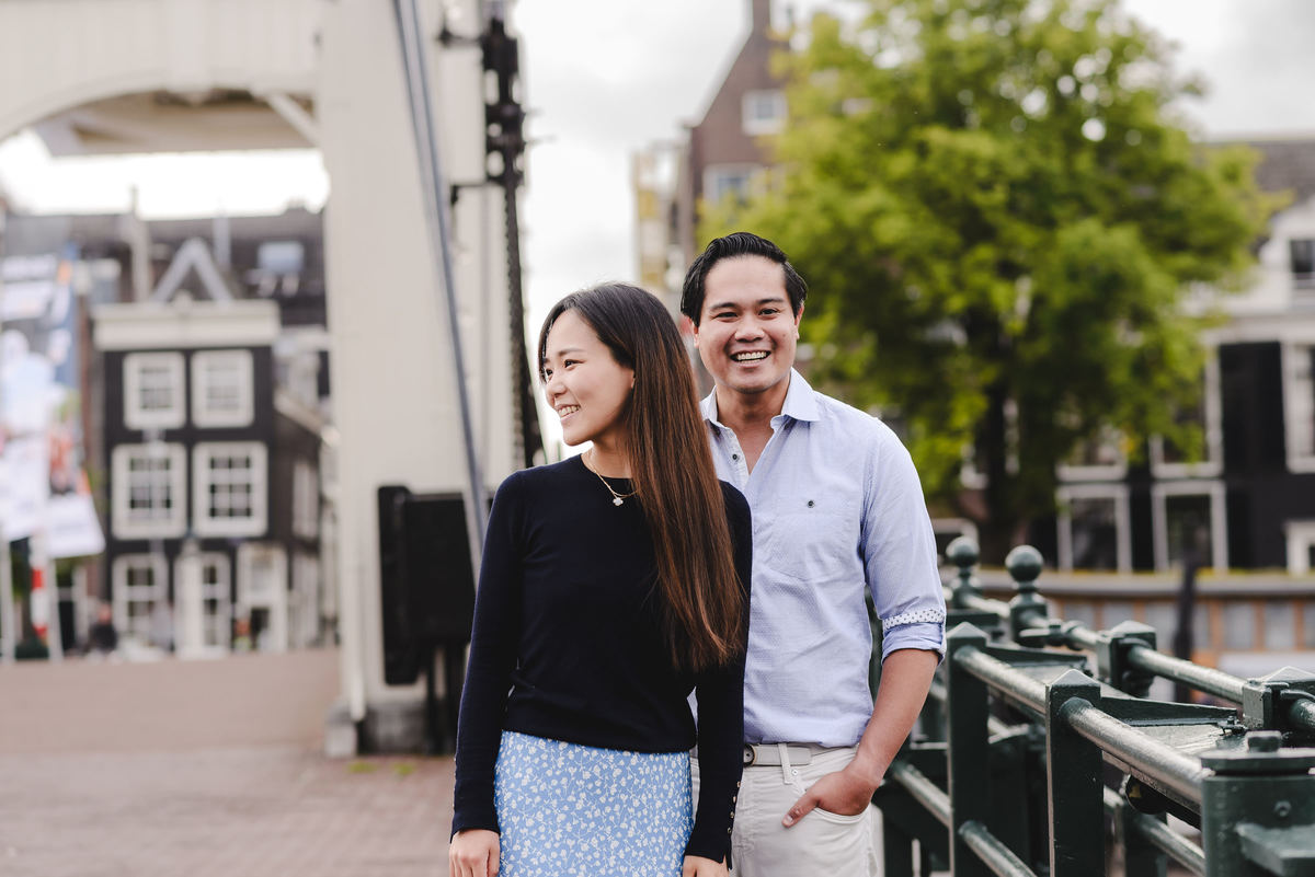 Capture Your Romantic Getaway in Amsterdam: Vacation Photographer for Couples. Explore Amsterdam's Canals and Bridges, Admire Iconic Houses and Bicycles in Pictures