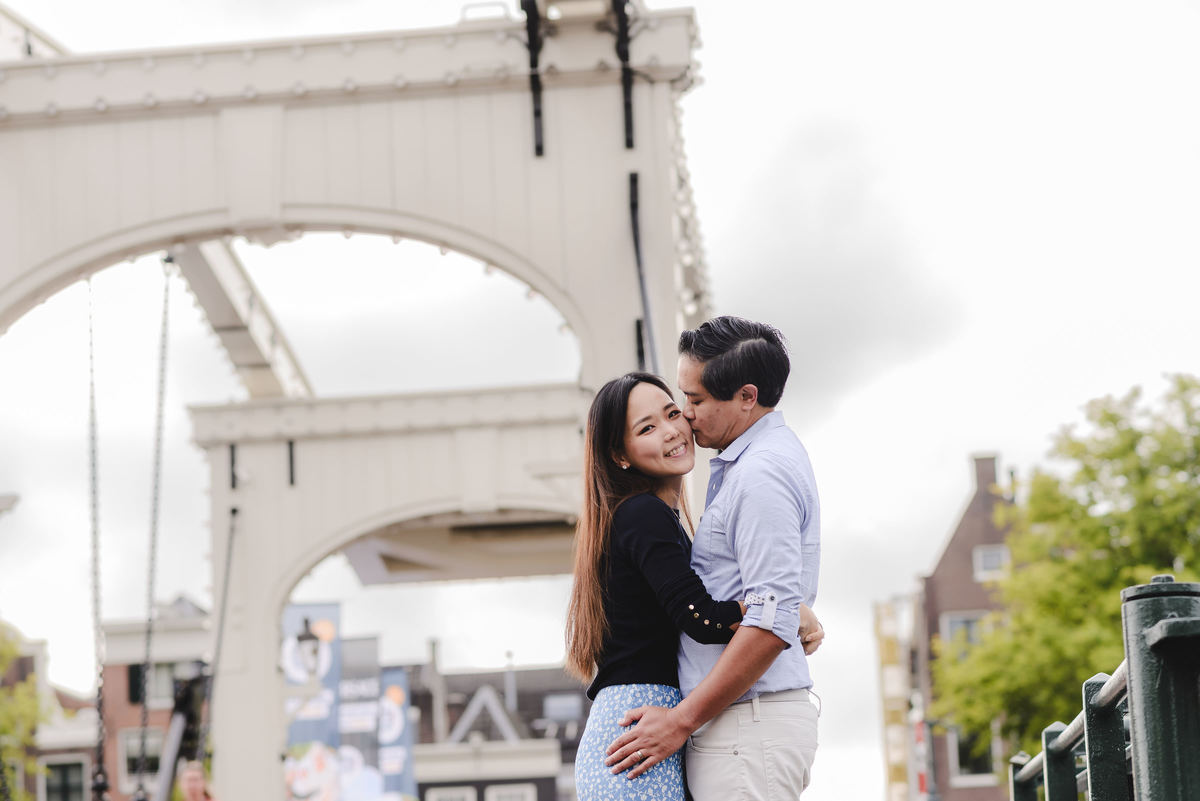 Capture Your Romantic Getaway in Amsterdam: Vacation Photographer for Couples. Explore Amsterdam's Canals and Bridges, Admire Iconic Houses and Bicycles in Pictures