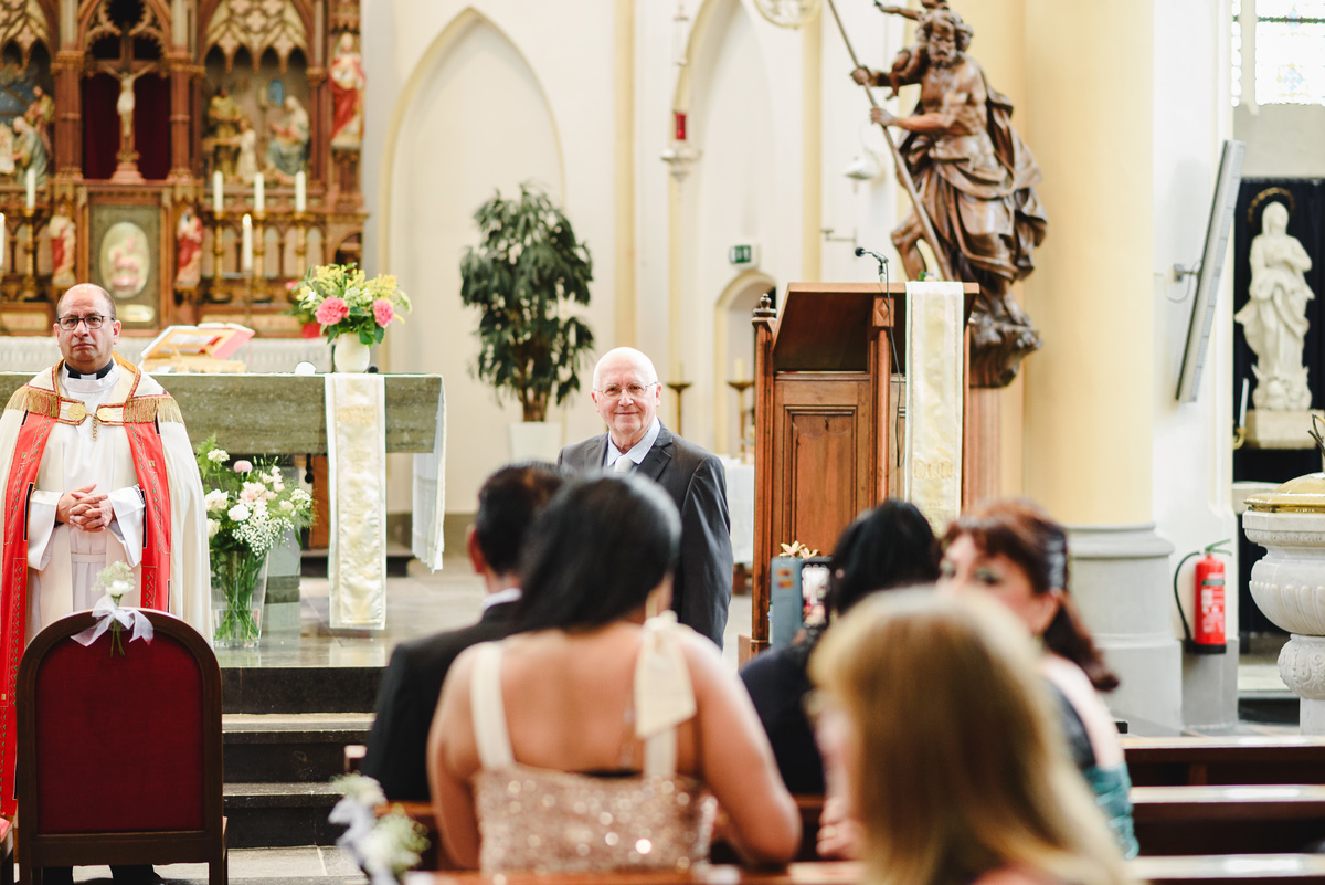 wedding day in schagen, religious ceremony in a church, spanish speaking priest in the netherlands, catholic ceremony, wedding photographer trouwfotograaf