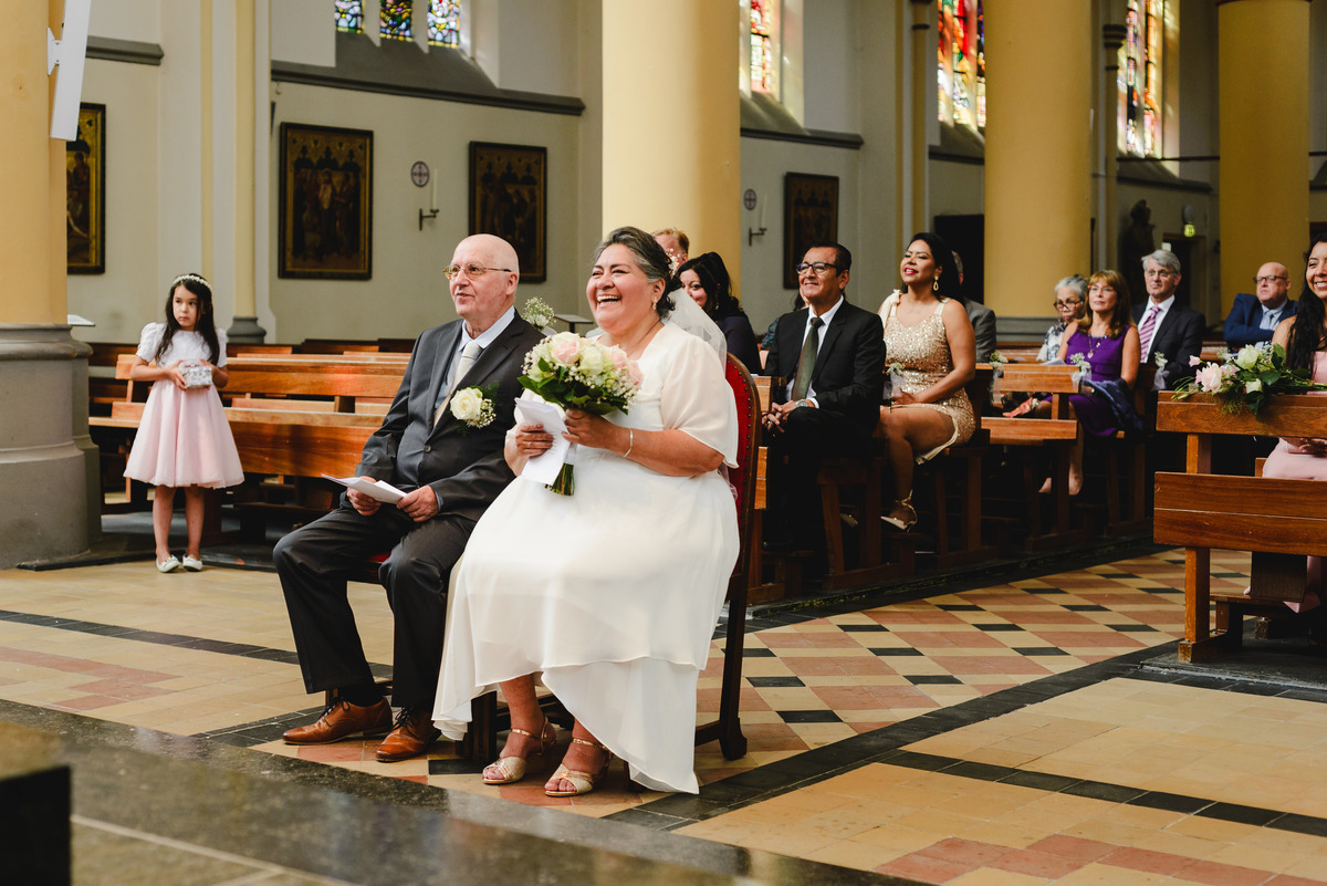 wedding day in schagen, religious ceremony in a church, spanish speaking priest in the netherlands, catholic ceremony, wedding photographer trouwfotograaf