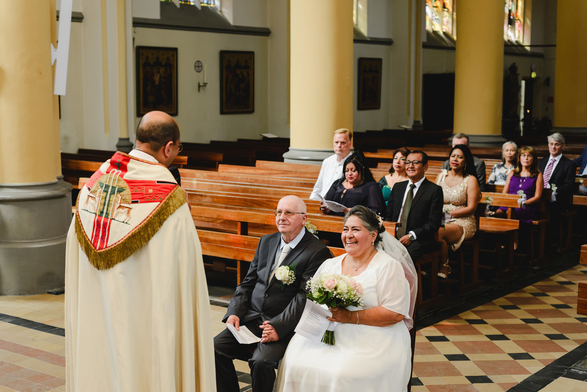 wedding day in schagen, religious ceremony in a church, spanish speaking priest in the netherlands, catholic ceremony, wedding photographer trouwfotograaf