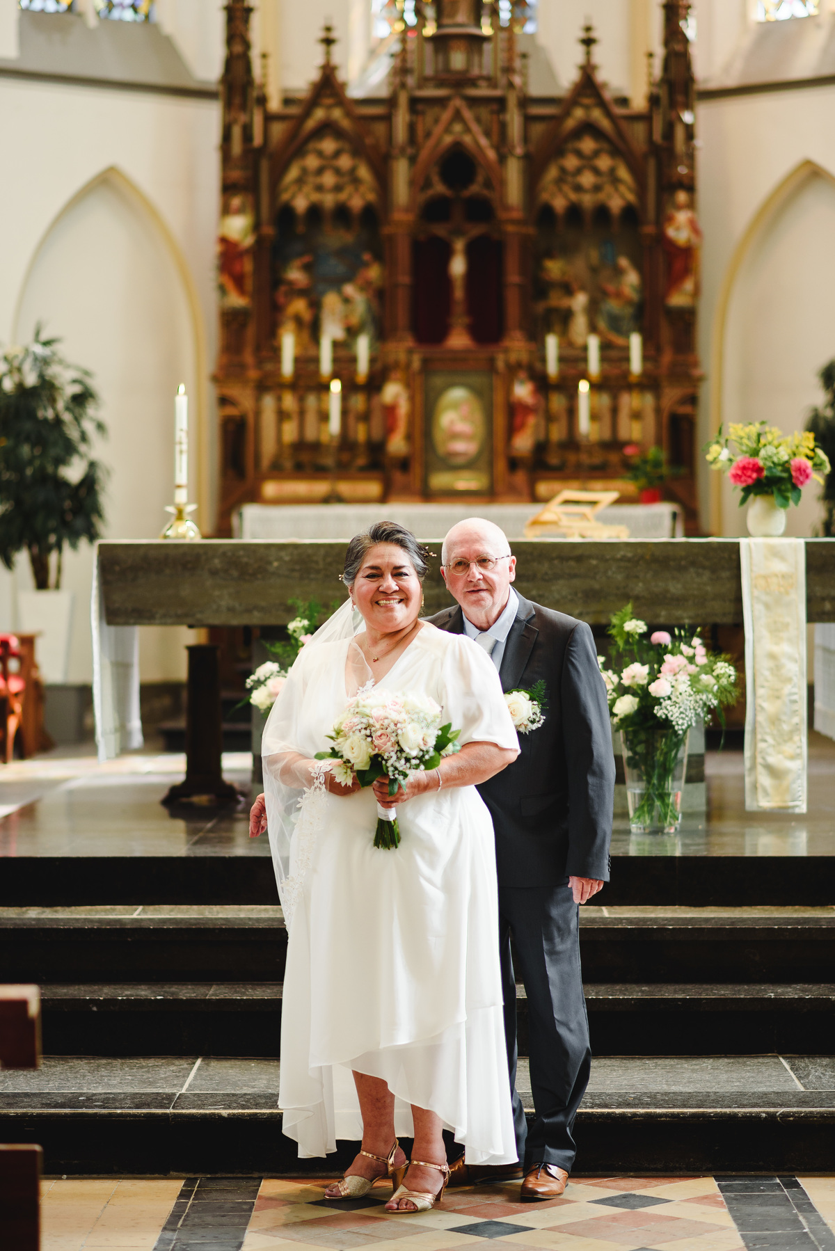 wedding day in schagen, religious ceremony in a church, spanish speaking priest in the netherlands, catholic ceremony, wedding photographer trouwfotograaf