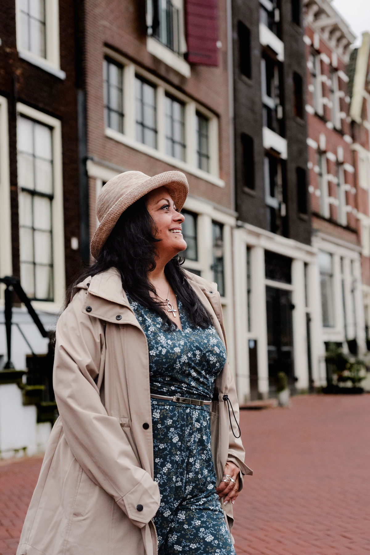 Vacation photographer in Amsterdam making a photo session of a travel agent in the canals and bridges of the city center of Amsterdam. This was a branding photo session made for Flytographer