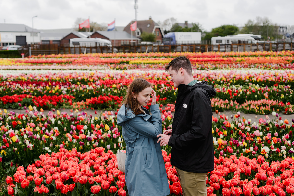 A Rainy Day Proposal at Tulip Experience Amsterdam: Capturing Love in Every Weather