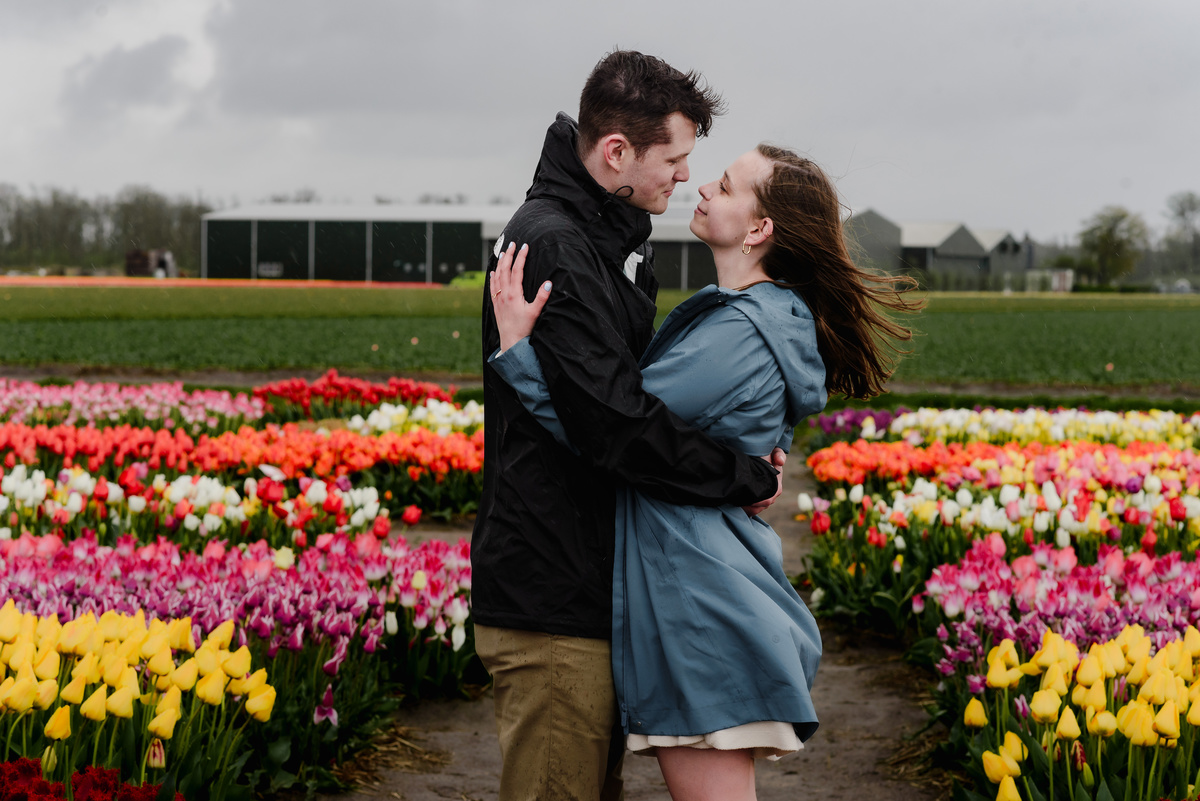 A Rainy Day Proposal at Tulip Experience Amsterdam: Capturing Love in Every Weather