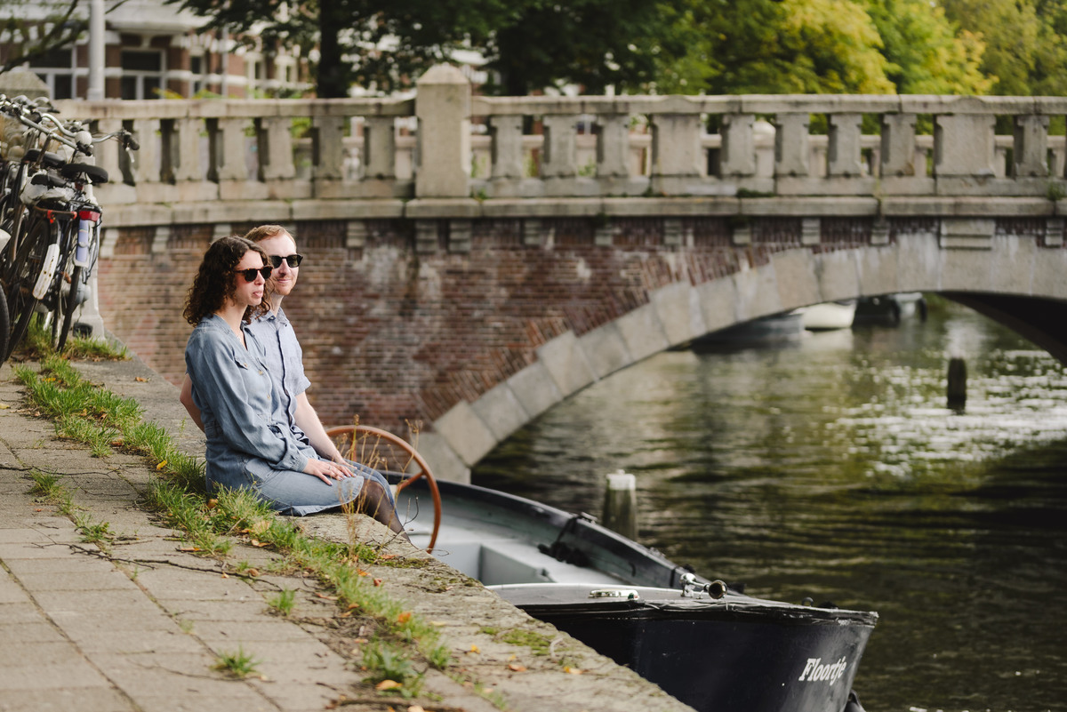Surprise engagement proposal in Amsterdam, The Netherlands. Couple Photo session after the proposal.