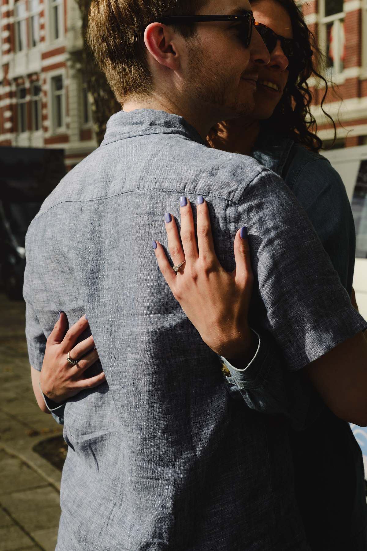 Surprise engagement proposal in Amsterdam, The Netherlands. Couple Photo session after the proposal.