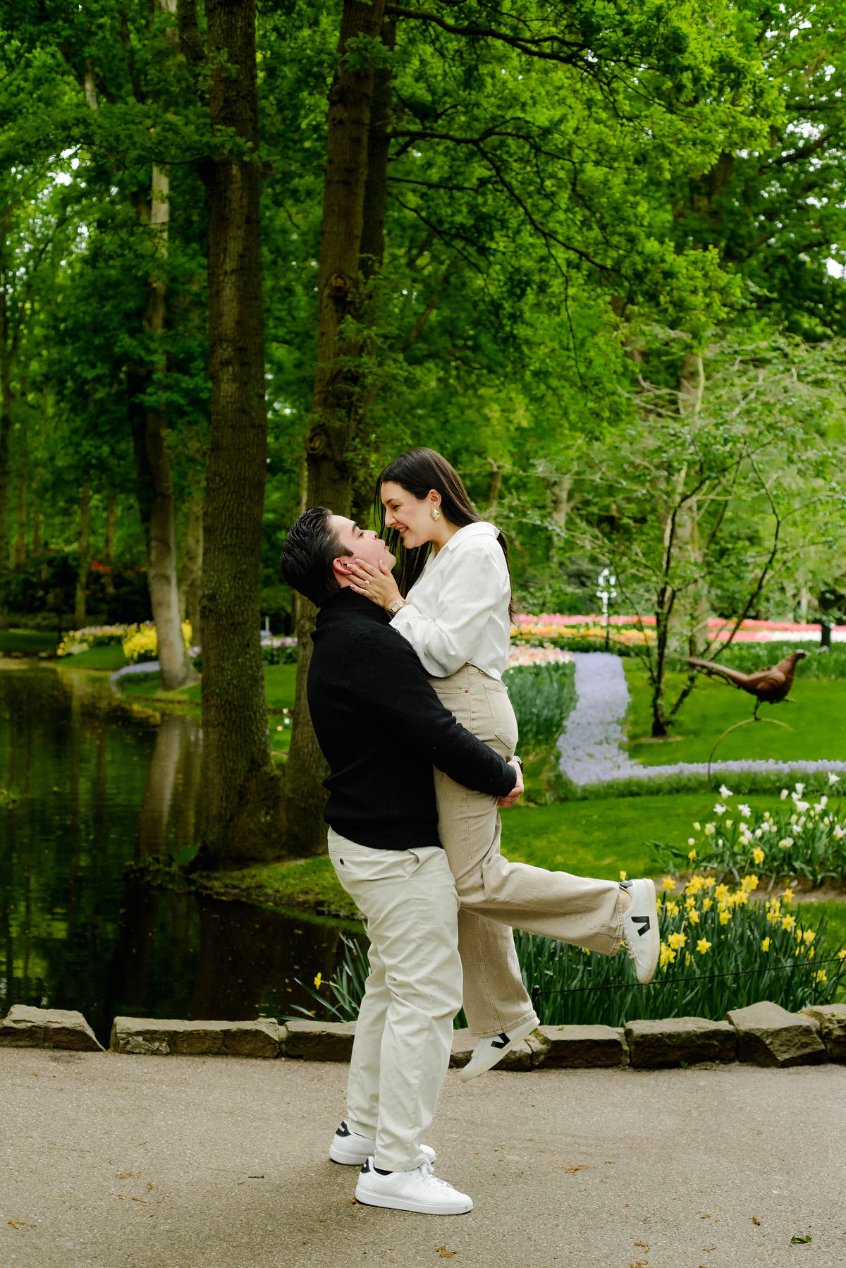 Surprise engagement proposal at Keukenhof Gardens during tulip season in May
