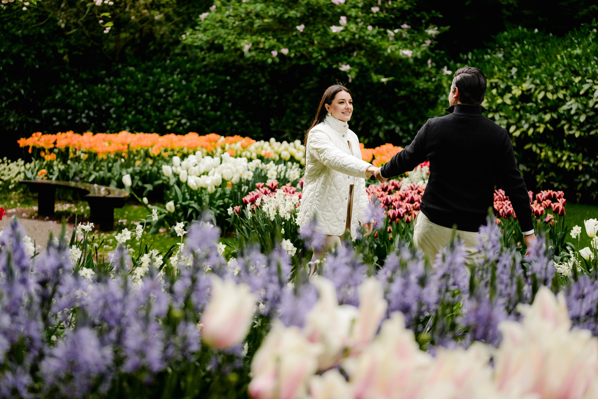 Surprise engagement proposal at Keukenhof Gardens during tulip season in May