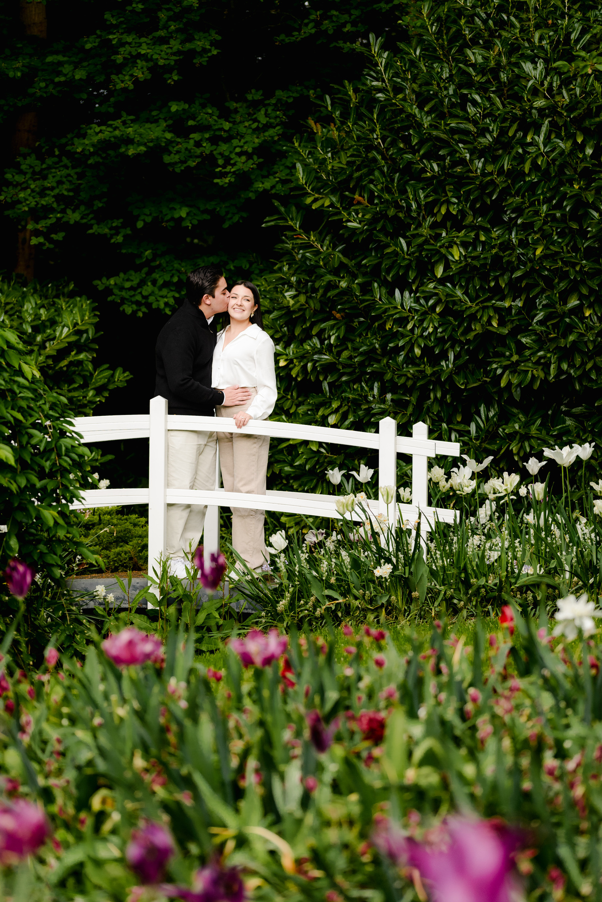 Surprise engagement proposal at Keukenhof Gardens during tulip season in May