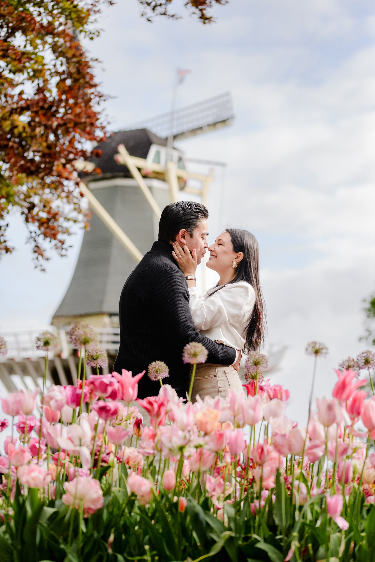 Surprise engagement proposal at Keukenhof Gardens during tulip season in May
